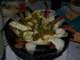 Hot Molcajete - this one with sizzling strips of beef and melting cheese bathed in salsa verde